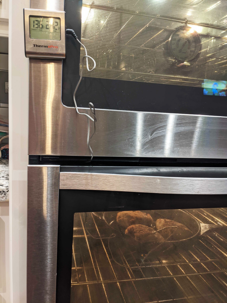 Thermometer on a oven with probe.