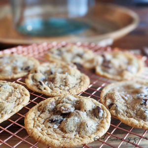 chocolate chip cookies on a wire cooling rack.